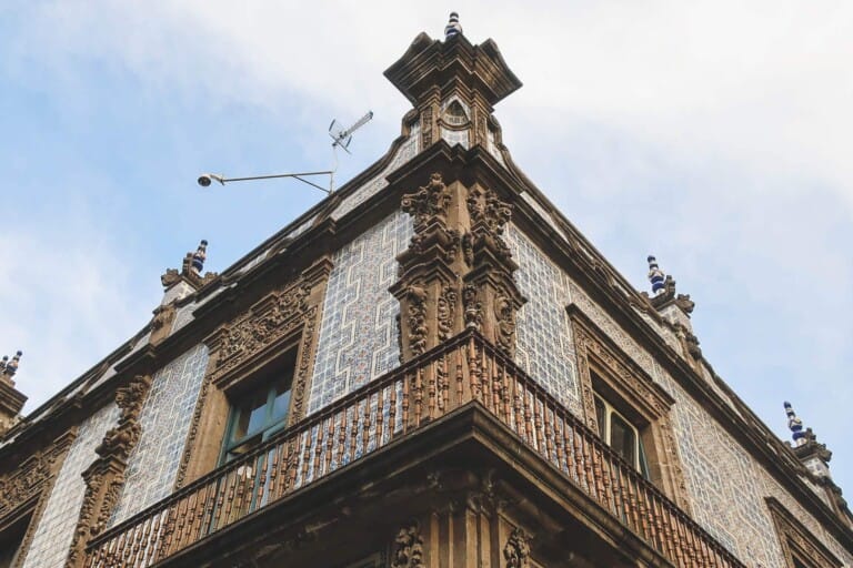A blue and white tiled colonial building