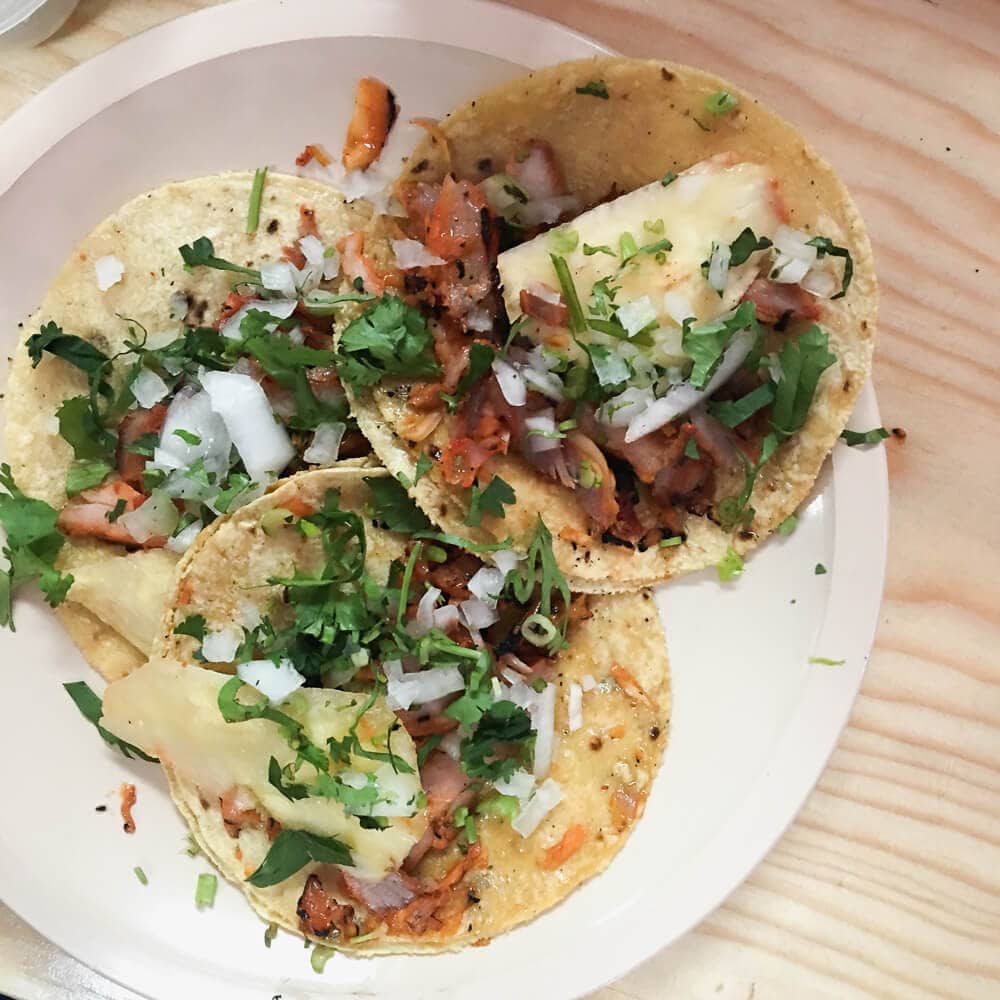 A plate with three tacos