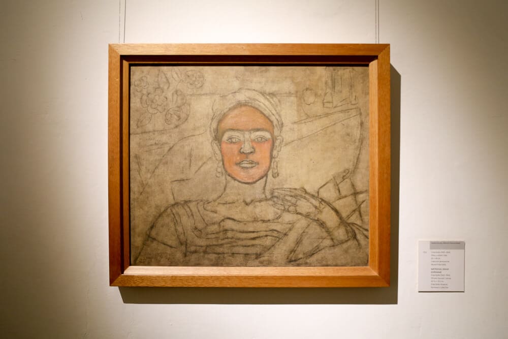 A self-portrait painting by frida kahlo