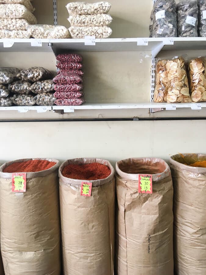 Large paper bags filled with spices