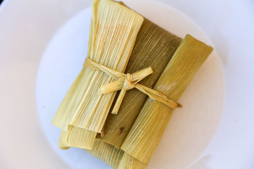 A tamale on a plate