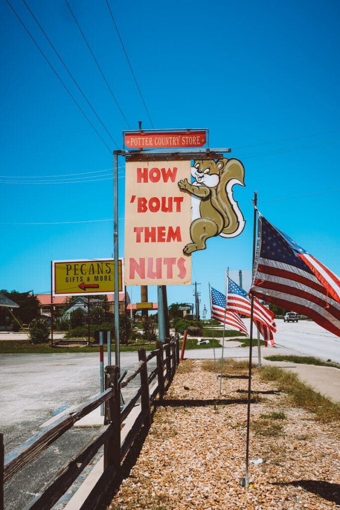 A sign advertising the sale of pecans