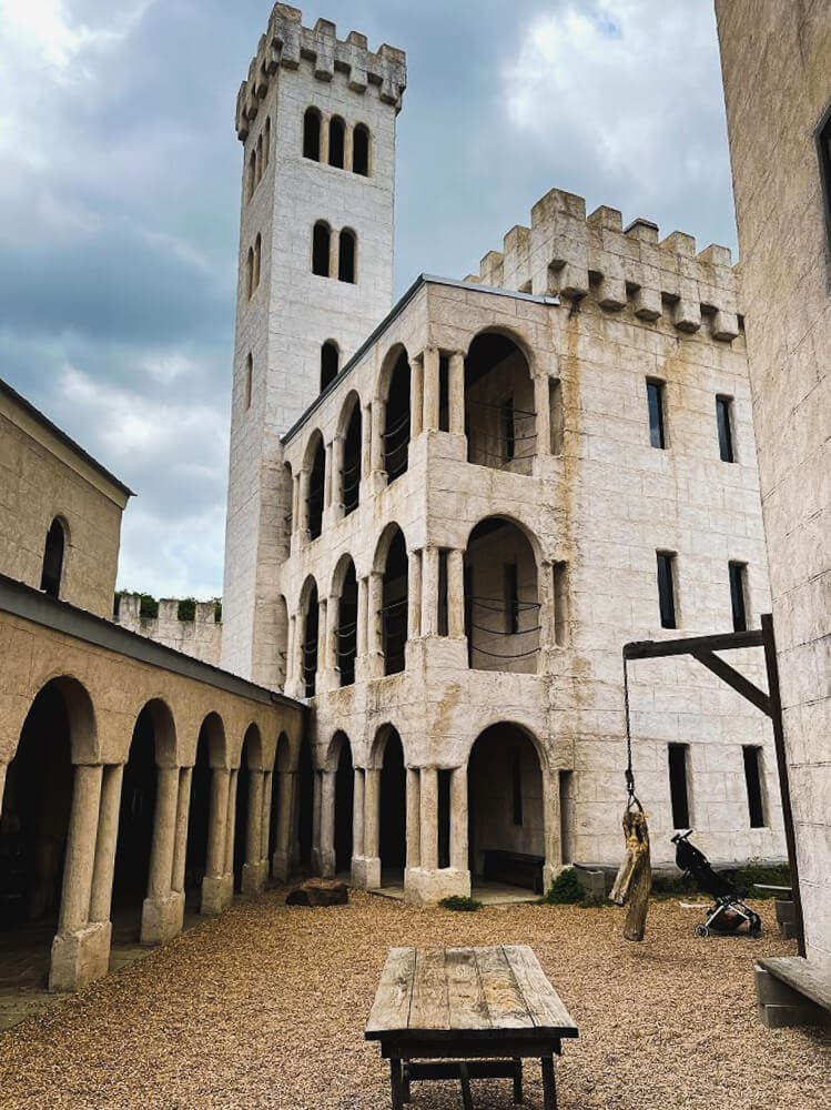 A courtyard in a three story stone castle in Texas