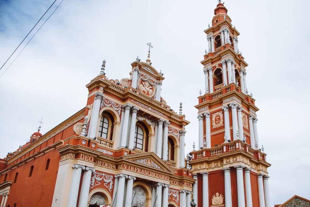 Red and yellow basilica with white columns