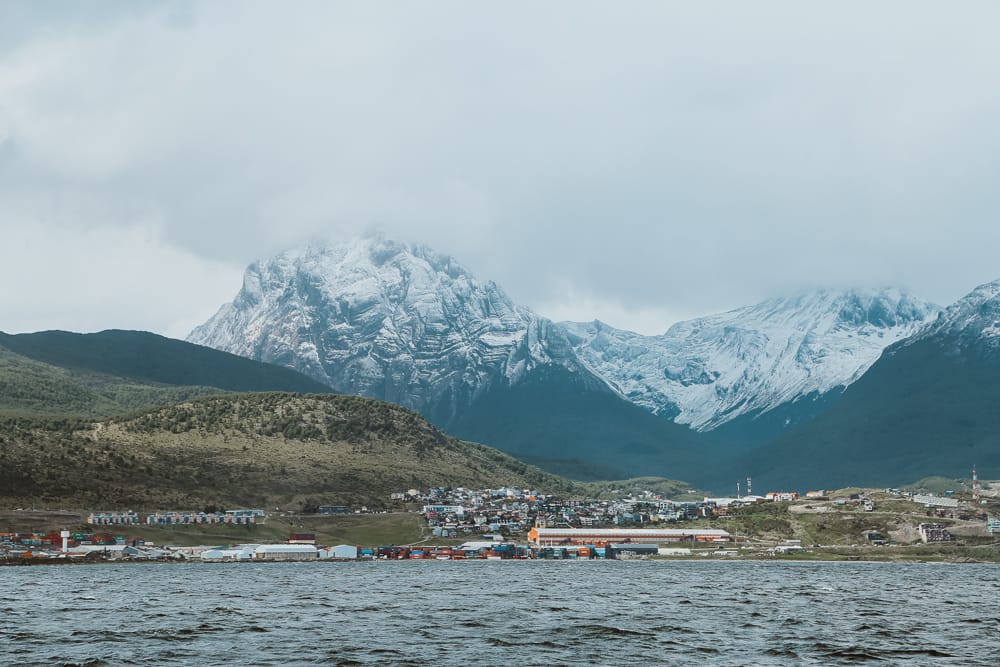 Snow covered mountains seen from the water