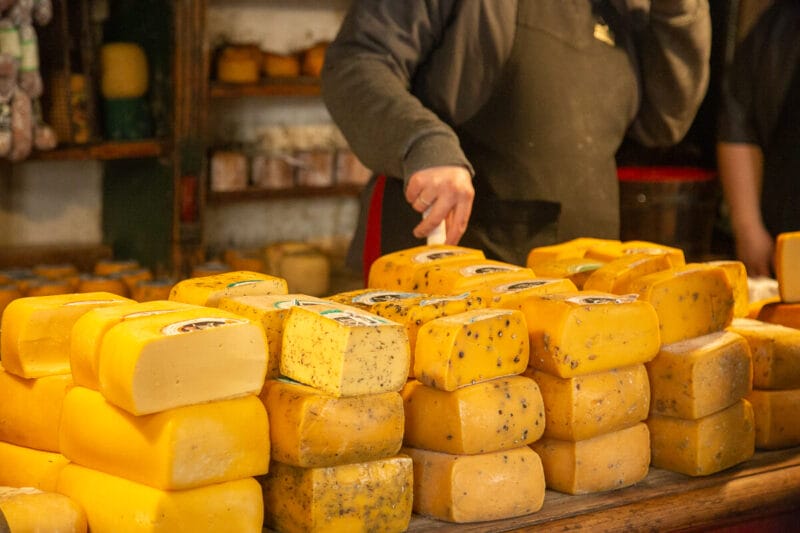 Piles of cheese on a table at an Argentina general store in Tandil