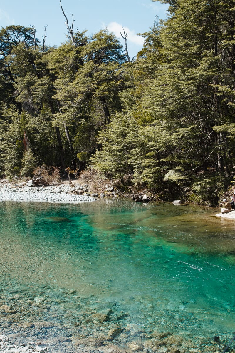 Transparent turquoise waters of the Rio Azul river in El Bolson Patagonia