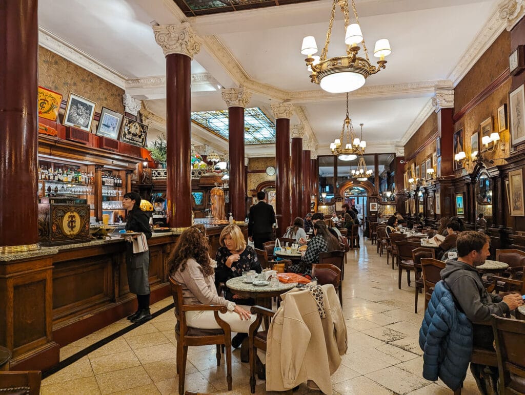 People dining at tables in the European styled Cafe Tortoni on Buenos Aires' Avenida de Mayo