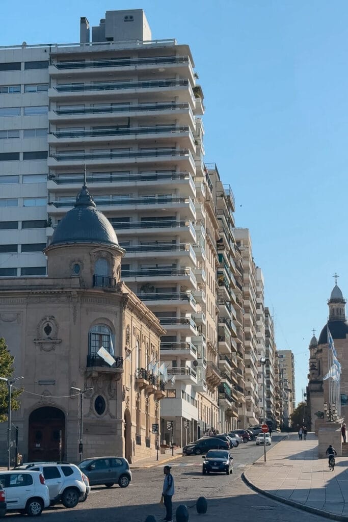 Massive modern apartment towers stand in contrast to an original 18th century home